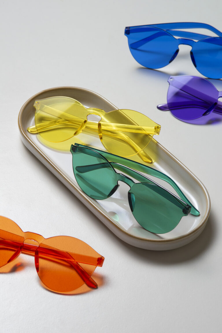 colored transparent sunglasses still life (1)