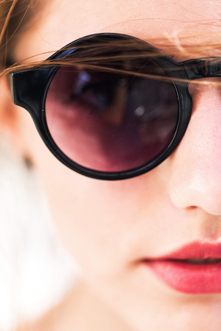 pretty girl in round sunglasses